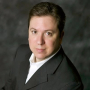 Elvis Moreland CISSP-ISSEP, CGEIT, CISM - PeerSpot reviewer